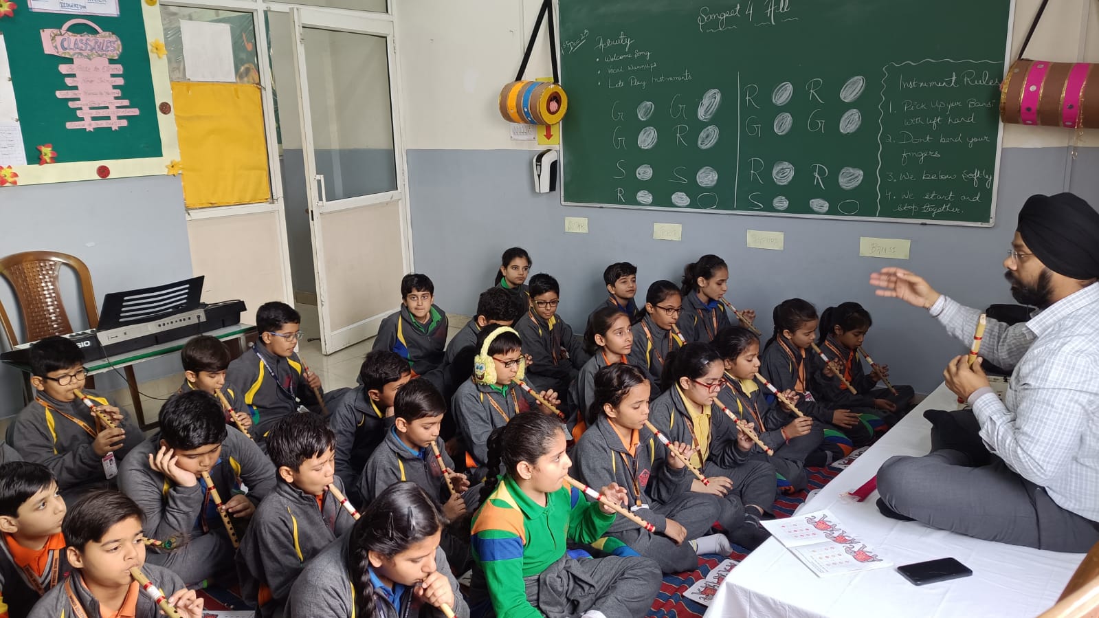 Children playing the Bansi