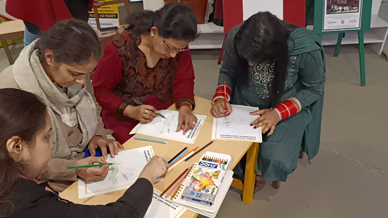 Teachers working through assessment